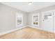 Light-filled living room featuring hardwood floors at 526 S Green St, Statesville, NC 28677