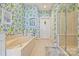 Bathroom with garden tub and walk-in shower at 8120 Oratorio Pl, Charlotte, NC 28270