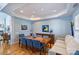 Bright dining room with hardwood floors and large windows at 8120 Oratorio Pl, Charlotte, NC 28270