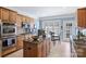 Eat-in kitchen with granite island and stainless steel appliances at 8120 Oratorio Pl, Charlotte, NC 28270