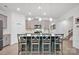 Eat-in kitchen with island seating and gray cabinets at 132 N Shayna Rd, Troutman, NC 28166