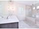 Bathroom features double vanity, tile flooring, glass enclosed shower, and ample light at 1364 Cedardale Ln, Denver, NC 28037