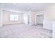 Spacious bonus room with neutral carpet, recessed lighting, and ample natural light at 1364 Cedardale Ln, Denver, NC 28037