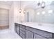Spa-like bathroom featuring double sinks, modern fixtures, and walk-in closet at 1374 Cedardale Ln # 33, Denver, NC 28037