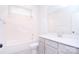 Bathroom featuring a shower-tub combo, tile flooring, and vanity sink at 1374 Cedardale Ln # 33, Denver, NC 28037