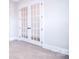 Elegant white french doors provide lots of natural light and access to other rooms at 1374 Cedardale Ln # 33, Denver, NC 28037