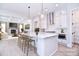 Bright kitchen features an island with marble countertop, modern appliances, and pendant lighting at 1374 Cedardale Ln # 33, Denver, NC 28037