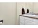 Small half bathroom with pedestal sink and wood-look flooring at 1485 Adkin Dr, Iron Station, NC 28080