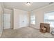 Bright bedroom featuring neutral walls and carpet at 1485 Adkin Dr, Iron Station, NC 28080