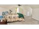 Bedroom with a floral bedspread and a treadmill at 1485 Adkin Dr, Iron Station, NC 28080