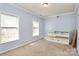 Spacious bedroom with light walls and two windows at 1485 Adkin Dr, Iron Station, NC 28080