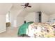 Bright bedroom with floral bedding and a window seat at 1485 Adkin Dr, Iron Station, NC 28080