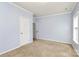 Simple bedroom with light walls and carpet at 1485 Adkin Dr, Iron Station, NC 28080
