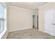 Well-lit bedroom with neutral walls and carpet at 1485 Adkin Dr, Iron Station, NC 28080