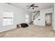 Bright bonus room with neutral carpeting and large windows at 1485 Adkin Dr, Iron Station, NC 28080