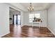 Dining room with hardwood floors and chandelier at 1485 Adkin Dr, Iron Station, NC 28080