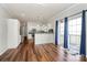 Kitchen and dining area with hardwood floors and deck access at 1485 Adkin Dr, Iron Station, NC 28080