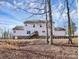 House exterior with wooded backyard at 1485 Adkin Dr, Iron Station, NC 28080