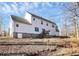 Rear view of the house with deck at 1485 Adkin Dr, Iron Station, NC 28080