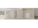 Unfinished basement with neutral walls and sliding glass door at 1769 Old Nc 27 Hwy, Mount Holly, NC 28120
