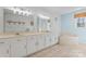 Double vanity bathroom with soaking tub and updated fixtures at 1769 Old Nc 27 Hwy, Mount Holly, NC 28120