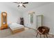 Bedroom with twin bed, arcade game, and built-in shelving at 1769 Old Nc 27 Hwy, Mount Holly, NC 28120
