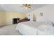 Bedroom with carpeted floor, ceiling fan, and window views at 1769 Old Nc 27 Hwy, Mount Holly, NC 28120