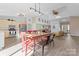 Open dining room with kitchen access and seating for six at 1769 Old Nc 27 Hwy, Mount Holly, NC 28120