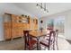 Bright dining room with wood farm table and large built-in hutch at 1769 Old Nc 27 Hwy, Mount Holly, NC 28120