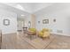 Living room with wood floors, two armchairs and entryway view at 1769 Old Nc 27 Hwy, Mount Holly, NC 28120