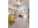 Open-concept living area featuring vaulted ceilings, a modern fan, and seamless flow into the kitchen at 1769 Old Nc 27 Hwy, Mount Holly, NC 28120