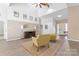 Spacious living room features vaulted ceilings, wood-look floors, and a cozy sitting area at 1769 Old Nc 27 Hwy, Mount Holly, NC 28120