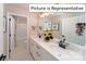 Modern bathroom with double vanity and shower at 2019 Canvasback Way, Indian Trail, NC 28079