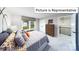 Bright bedroom with large window and ensuite access at 2019 Canvasback Way, Indian Trail, NC 28079