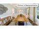 Formal dining room with wood floors, light walls, and a large wooden table at 2019 Canvasback Way, Indian Trail, NC 28079