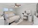 Main bedroom with tufted headboard and vanity at 226 J.P. Dr, Albemarle, NC 28001