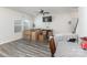 Living room with hardwood floors and several moving boxes at 226 J.P. Dr, Albemarle, NC 28001