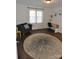 Cozy bedroom with a round rug, armchair, and home office space at 733 Azalea Dr, Chester, SC 29706