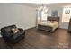 Bright bedroom featuring wood-look floors and plenty of natural light at 733 Azalea Dr, Chester, SC 29706