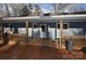 Inviting front porch with wooden railings and deck at 733 Azalea Dr, Chester, SC 29706