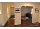 Bright hallway with dark hardwood floors and access to other rooms at 733 Azalea Dr, Chester, SC 29706