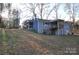 Back of house with screened porch and deck at 733 Azalea Dr, Chester, SC 29706