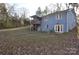Back of house with deck and patio area at 733 Azalea Dr, Chester, SC 29706