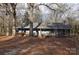 Blue house with a large front porch and yard at 733 Azalea Dr, Chester, SC 29706