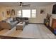 Spacious living room featuring a comfortable sectional sofa and large windows at 733 Azalea Dr, Chester, SC 29706
