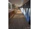 Long side porch with wooden deck and railings at 733 Azalea Dr, Chester, SC 29706