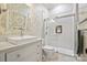 Charming bathroom with a floral-print wallpaper and shower at 10439 Donahue Dr, Huntersville, NC 28078