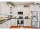 Well-equipped kitchen with stainless steel appliances and white cabinetry at 10439 Donahue Dr, Huntersville, NC 28078