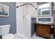 Updated bathroom with subway tile shower and vintage vanity at 106 N Battleground Ave, Kings Mountain, NC 28086