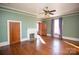 Bright bedroom with hardwood floors, fireplace, and large windows at 106 N Battleground Ave, Kings Mountain, NC 28086